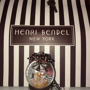 Henri Bendel Christmas carousel snowglobe ornament